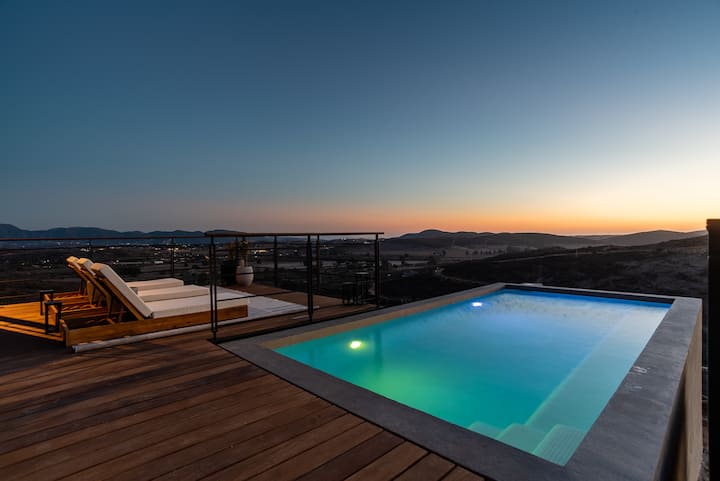 Golden hour at the pool, the valley falling away to the west