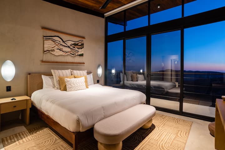 A bedroom that opens straight onto the view