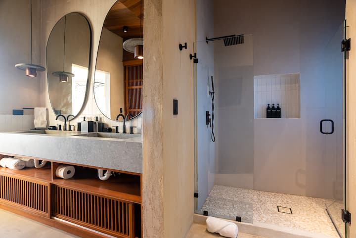 Shower and vanity under natural light