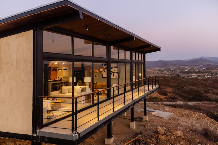 The glass facade catching the last light