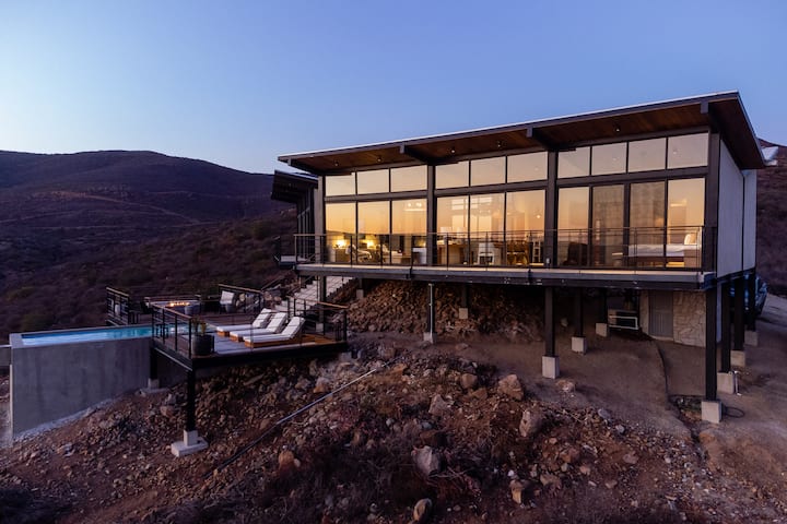 Casa Finch on the crest as the sky turns rose
